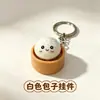 Llavero con forma de bollo antiestrés transfronterizo con una función de luz de un solo botón, un dije creativo y lindo para bolso, un gadget antiestrés y un regalo perfecto