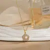 Colar para Mulheres, Flor de Zircônia Bauhinia Giratória da Moda Nicho Moda Novo Design Pingente Titânio Aço Colar de Temperamento
