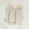 Cajas de joyería de estilo minimalista al por mayor en stock. Estilo cajón, diseño de tapa superior e inferior, adecuado para collares, anillos, pendientes y como empaque de regalo