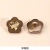 Botón metálico de tacón alto estilo Chanel con decoración de lazo en forma de flor de ciruelo, accesorio de moda para DIY de camisas y cárdigans