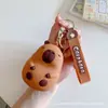 Bolsa de monedas popular de Capibara Llavero Cabeza de silicona Bolsa de almacenamiento para auriculares Bolso colgante Accesorios Regalos pequeños Al por mayor