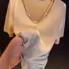 2025 Nuevo Estilo de Verano Cuello en V Color Puro Recorte Delgado Manga Corta Camiseta Moda Femenina Reductor de Edad Look Adelgazante Top es Popular Este Año