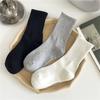 Medias clásicas en blanco y negro y gris para hombre y mujer, de color liso, con cintura antideslizante, de tubo medio, para deportes, informales, transpirables, de algodón.