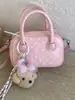 Bolso cuadrado pequeño de lunares transfronterizo de nicho, nuevo modelo popular para el verano de 2026, bolso de un hombro cruzado, casual, moderno, a la moda, adecuado para ir al trabajo