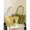 2026 Nova Bolsa Tote Elegante Simples Vazada Transfronteiriça, Bolsa de Ombro Casual Versátil para Mulheres, Bolsa Feminina de Grande Capacidade