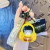 Mochila escolar com luz original chaveiro urso astronauta desenho animado luminoso astronauta casal pingente de mochila pequeno presente