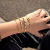 Elegante e Discreto Estilo Clássico Pulseira de Aço Inoxidável Dourado 18K com Pedra Pentagrama, Toque de Luxo Leve de Alta Qualidade, Joia Transfronteiriça com Senso de Design para Mulheres