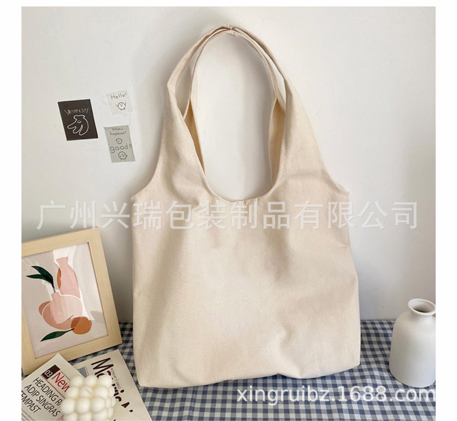 新款上课大学生小众单肩帆布包_10.jpg