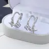 Brincos de Trevo de Quatro Folhas com Zircônia Incrustada em Cobre de Luxo Leve, Brincos Exquisitos e de Alto Padrão com Pétalas de Flor, Venda Direta da Fábrica