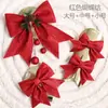 Venta al por mayor de fábrica Accesorios de Navidad Adornos forma tridimensional Adornos de pared Lazo Colgantes de árbol de Navidad Suministros de decoración