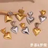 Brincos de Cruzamento Europeus e Americanos Novo Brinco com Pingente de Coração Dupla Camada Aço Inoxidável Banhado a Ouro 18K Brincos Gradientes Versáteis para Mulheres