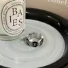 Anillo Abierto Minimalista Geométrico con Goteo de Aceite de Flor de Iris Redonda para Mujer, Anillo de Dedo Índice de Alta Gama de Nicho, Accesorio de Mano de Moda y Único