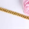 Venta al por mayor de fábrica de accesorios de ropa de encaje dorado al contado, cortina de encaje, exquisito color nacional, encaje dorado y plateado