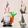 Amazon nueva decoración de Pascua muñeco sin rostro cuadros blanco y negro conejo de peluche sosteniendo rábano pareja adornos de gnomo