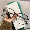 38029 moda 2024 nuevas gafas de sol anti-luz azul con deformación de color para mujer, montura de espejo plano, venta al por mayor de fábrica para hombres, montura completa