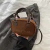 Bolso de mano sencillo de color liso para mujer 2025, bolso bandolera de alta gama, bolso de bolos para mujer popular de este año, de moda