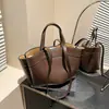 Bolso tote minimalista de cuero suave de gran capacidad transfronterizo, un conjunto elegante y práctico para el día a día que incluye un bolso principal y un bolso más pequeño, bolso de hombro, hecho a medida para exportación, bolso de mujer