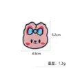 Suministro directo de fábrica fuente pegatinas de tela de rana linda dibujos animados accesorios de ropa bolsas de gato y perro bordado decorativo en stock al por mayor