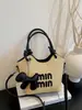 Venta al por mayor transfronteriza de bolsos nuevos tejidos a mano, bolsos de moda nuevos 2026, bolsos tipo cubo para mujer, bolsos de hombro y cruzados de alta gama