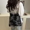 Bolsa de Lona de Verano 2026 Nuevo Estilo Japonés Moda Chica Suave Bolso de Hombro Gran Capacidad Casual Bolso Cruzado de Hombro Tipo Cubo