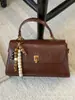 Bolsa de Mão Retrô Feminina 2025 Nova Inverno High-End Nicho Luxo Acessível Bolsa de Ombro para o Dia a Dia Transversal Pequena Quadrada