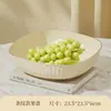 Plato de frutas color crema sala de estar mesa de centro del hogar 2025 nuevo estilo lujo ligero celebridad de internet cesta de frutas frutero plato de dulces y bocadillos