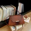Bolso de mano de moda estilo coreano, bolso tote pequeño para mujer, nuevo modelo 2026, bolso Kelly con estampado de piedra, bolso cuadrado pequeño elegante para hombro y cruzado