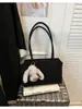 Bolsa Tote Minimalista Transfronteiriça para Mulheres 2025 Inverno Novo Estilo Alta Qualidade Nicho Retrô Ombro Axila