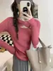 Camisa base de malha vazada para mulheres, primavera e outono, suéter pullover justo, modelagem slim, top de manga comprida, tamanho único, estilo europeu e americano