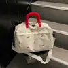 Bolsa de equipaje de almacenamiento de moda portátil para viajes cortos 2026, bolsa de viaje, bolsa de natación de gran capacidad, bolsa cruzada para gimnasio