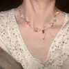 ¡¡¡Súper lindo!!! Collar Colgante Perro Globo M&M Rojo para Mujer, Nuevo Accesorio de Cadena para Suéter de Alta Gama Otoño e Invierno 2025
