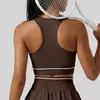 Top de tirantes tipo racerback de malla color durazno con copas fijas, franjas de color contrastante, sujetador deportivo para yoga, con soporte y a prueba de impacto