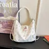 Bolsa de ombro minimalista de nicho com estampa de urso, bolsa tote versátil, bolsa de ombro de grande capacidade, mochila multiuso