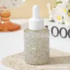 Botella gotero cosmética de 30 ml con incrustaciones de diamantes para comercio exterior transfronterizo, botella para aceites esenciales, botella gotero de vidrio, botella de muestra
