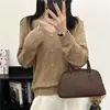 Elegante Suéter Feminino 2024 Novo com Decote V Vazado Redutor de Idade, Manga Longa, Cor Sólida, Base Soltinha Emagrecedor