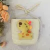 Bolsa pequeña de paja tejida de jirafa nueva de verano al por mayor, mini bolsa de paja floral linda para niños