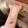 Collar Original Nuevo Retro Exquisito Moda Morado Trébol de Cuatro Hojas Calabaza Lujo Accesible Cadena Larga de Suéter de Gama Alta para Mujer