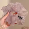 Estilo perezoso 2026 nuevo coletero de oso con pompón y diseño floral, accesorio para el cabello retro y de alta gama para mujeres