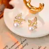 Widney Lujo Ligero Completamente Diamantados Mariposa Perla Pendientes Collar Alto Sentido Elegante Moda Traje Elegante Venta al por Mayor