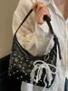 Verano 2025 Retro Diamante Cadena Pequeña para Mujer Nuevo Bolso de Hombro Casual para Viajar con Cerradura de Axila de Aspecto Sofisticado