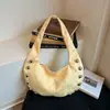 Bolsa Vintage com Rebites para Mulheres 2026 Novo Modelo Bolsa de Axila Simples Bolsa de Bolinho Personalizada Versátil para o Dia a Dia Bolsa de Ombro Transfronteiriça