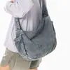 Bolsa jeans para mulheres, novo modelo 2026, casual e estilosa, adequada para a faculdade e o trabalho, bolsa tote de grande capacidade, bolsa de ombro e transversal