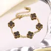 Acero de Titanio Chapado en Oro Transfronterizo Más Vendido Acero Inoxidable Pulsera, Collar, Anillo y Pendientes de Trébol de Cuatro Hojas Conjunto Fábrica al por Mayor