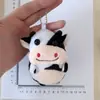 Lindo peluche de becerro animal muñeca colgante puesto venta al por mayor llavero de vaca colgante de felpa lote mixto