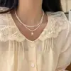 Colar de Pérolas Levemente Luxuoso para Mulheres, Design de Nicho Estilo Ins, Corrente de Clavícula com Borla em Forma de Coração, Corrente de Clavícula Versátil de Borboleta