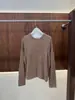 BORBOTIE Ropa de punto para mujer 2026 Primavera y Otoño Nuevo BC Color Sólido Cuello Redondo Hilo Hueco con Lentejuelas Manga Larga Blusa