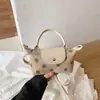 Bolso de mano patchwork de mezclilla lavada estilo americano y piel sintética, versátil para el uso diario, bolso ligero para mujer de hombro y cruzado