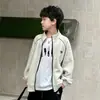 Ropa de Abrigo de Otoño para Niños 2026 Nuevo Estilo Niños Medianos y Mayores Otoño Niños Estilo Primavera/Otoño Chaqueta de Punto con Cuello Alto para Niños Moderna Genial