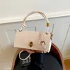 Bolso cuadrado pequeño de un solo hombro, temperamento casual, nicho simple, nuevo, tejido, retro, bolso cruzado, bolso oblicuo, otoño, versátil, 2026, bolso