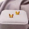 Pendientes de mariposa de acero de titanio con personalidad de estudiante súper hada de moda simple de estilo coreano, pendientes dobles estéreo esmerilados de oro rosa